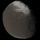 Illustration for article titled Astronomers say Saturn's moon Iapetus may have once had a mini-moon all its own